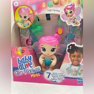 Baby Alive Glo Pixies Minis Carry ‘n Care Necklace Sugar Sprinkle Baby Doll 3.5”